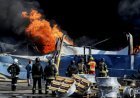 At least 27 dead and hundreds evacuated after strike on Kyiv warehouse