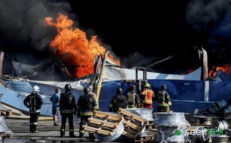 At least 27 dead and hundreds evacuated after strike on Kyiv warehouse