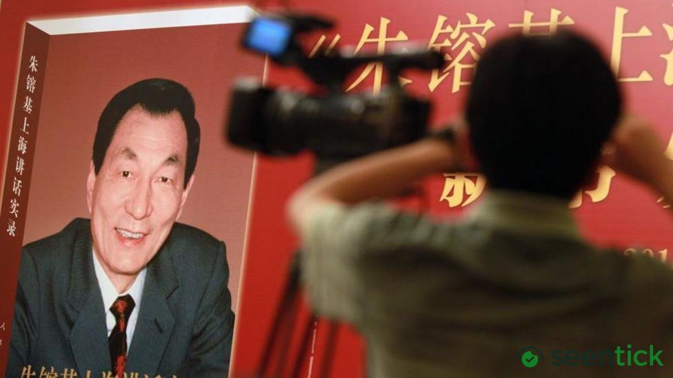 China censors public mourning as it holds former premier's funeral