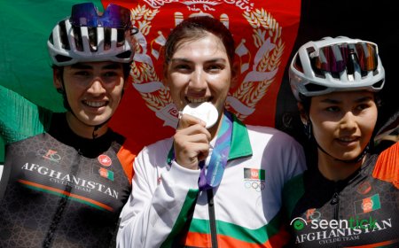 Cyclist who dressed as man to avoid Taliban wins silver medal