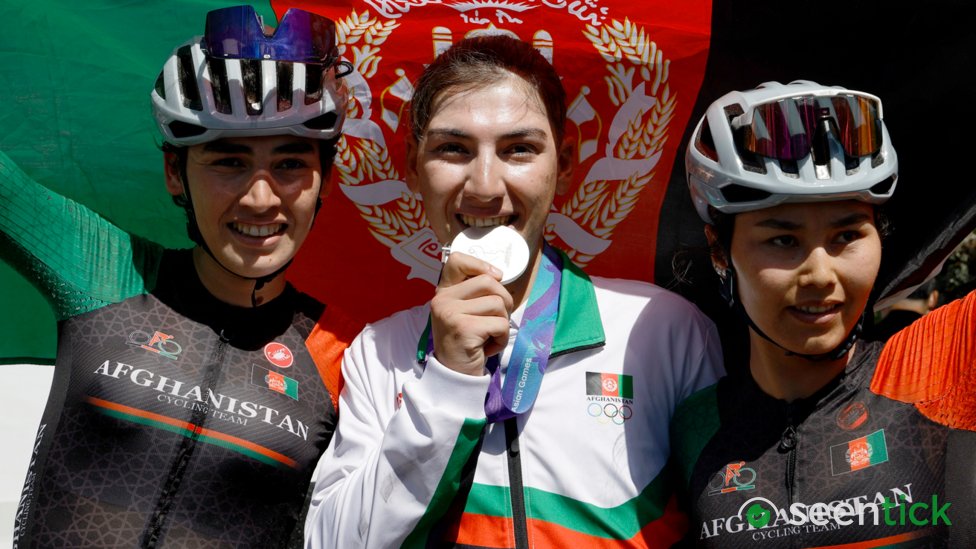 Cyclist who dressed as man to avoid Taliban wins silver medal