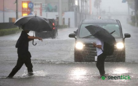 Millions urged to evacuate as powerful Typhoon Dujuan hits Japan