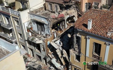 One dead and five missing after explosion destroys building close to Acropolis in Athens