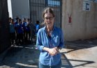 Pupils return to West Bank school behind barbed wire to protect against settlers
