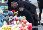 Kyiv bridge hit in further Russian drone attack as German chancellor makes surprise visit
