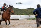 Residents airlifted to safety after flooding in central Chile