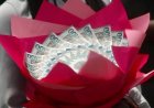 Seven arrested for using Ghanaian banknotes to make 'money bouquets'
